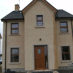 Derrylee Dungannon Oak top half opening windows and oak T&G pvc door.