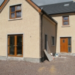 Derrylee Dungannon Oak pvc french doors and side hung window with top half opening.